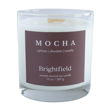 Mocha Candle from Brightfield with notes of espresso, chocolate and vanilla. Scented coconut soy candle in a glass jar with brown label